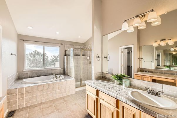 Bathroom, Dual Sink Vanities, Glass Shower, Interior, Recessed Lighting, Tile Countertops
