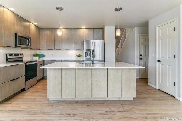 Interior, Kitchen, Pendant Lights, Recessed Lighting, Stainless Steel Appliances, Wood Texture Flooring
