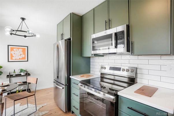Dining room, Interior, Kitchen, Pendant Lights, Stainless Steel Appliances, Wood Texture Flooring