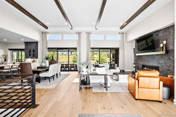 Dining room, Fireplace, Interior, Living room, Recessed Lighting, Wooden Beams, Wood Texture Flooring
