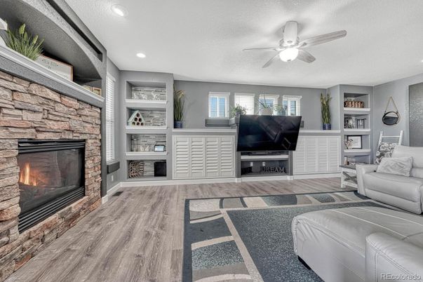 Fireplace, Interior, Recessed Lighting, Stone Walls, Wood Texture Flooring