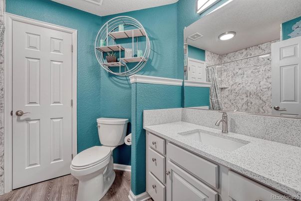 Bathroom, Interior, Marble Walls, Recessed Lighting, Wood Texture Flooring
