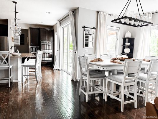 Dining room, Interior, Kitchen, Pendant Lights, Recessed Lighting, Stainless Steel Appliances, Wood Texture Flooring