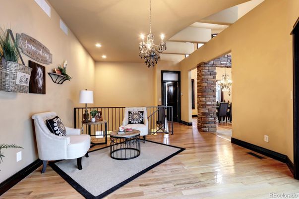 Chandelier, Interior, Living room, Recessed Lighting, Stone Walls, Wood Texture Flooring