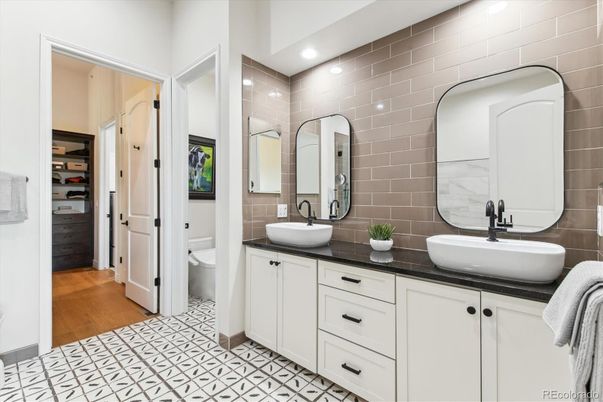 Bathroom, Dual Sink Vanities, Interior, Recessed Lighting, Wood Texture Flooring