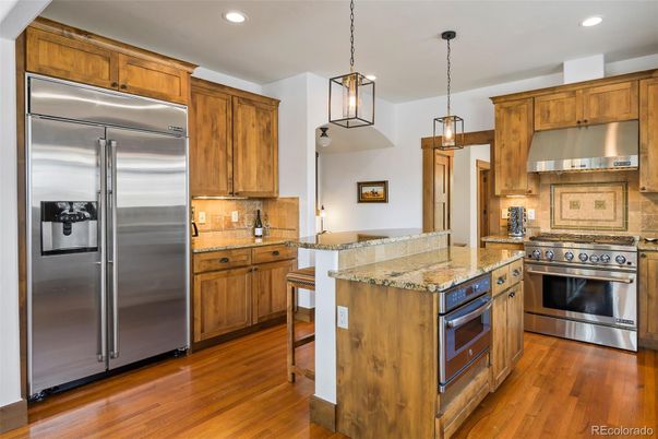 Interior, Kitchen, Pendant Lights, Recessed Lighting, Stainless Steel Appliances, Wood Texture Flooring