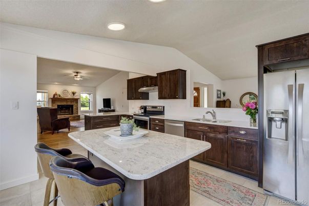 Fireplace, Interior, Kitchen, Living room, Recessed Lighting, Stainless Steel Appliances