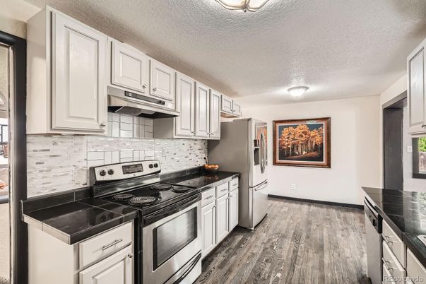 Interior, Kitchen, Tile Countertops, Wood Texture Flooring