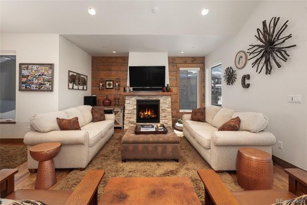 Fireplace, Interior, Living room, Recessed Lighting, Wood Texture Flooring