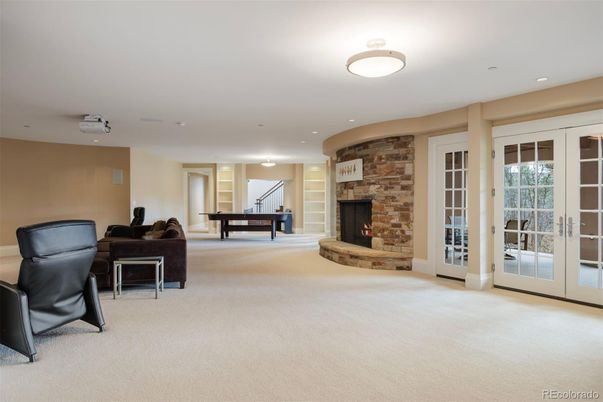 Billiard Table, Fireplace, Game Room, Interior, Living room, Recessed Lighting, Stone Walls