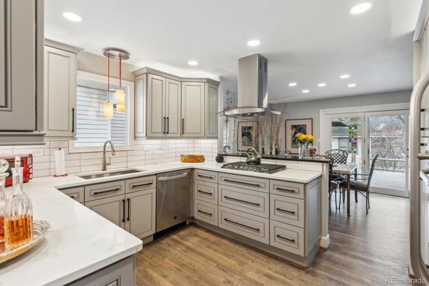 Dining room, Interior, Kitchen, Pendant Lights, Recessed Lighting, Stainless Steel Appliances, Wood Texture Flooring