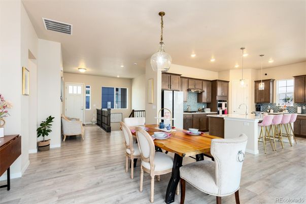 Dining room, Interior, Kitchen, Living room, Pendant Lights, Recessed Lighting, Stainless Steel Appliances, Wood Texture Flooring