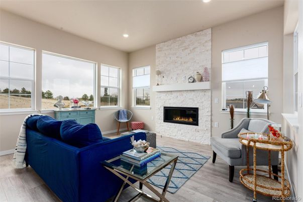 Fireplace, Interior, Living room, Recessed Lighting, Stone Walls, Wood Texture Flooring