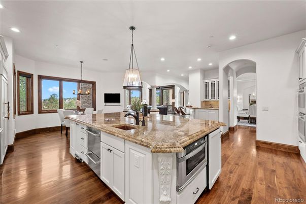 Dining room, Interior, Kitchen, Pendant Lights, Recessed Lighting, Stainless Steel Appliances, Wood Texture Flooring