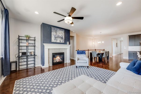 Dining room, Fireplace, Interior, Living room, Pendant Lights, Recessed Lighting, Wood Texture Flooring