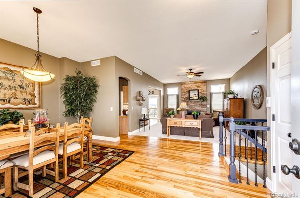 Dining room, Fireplace, Interior, Living room, Pendant Lights, Stone Walls, Wood Texture Flooring
