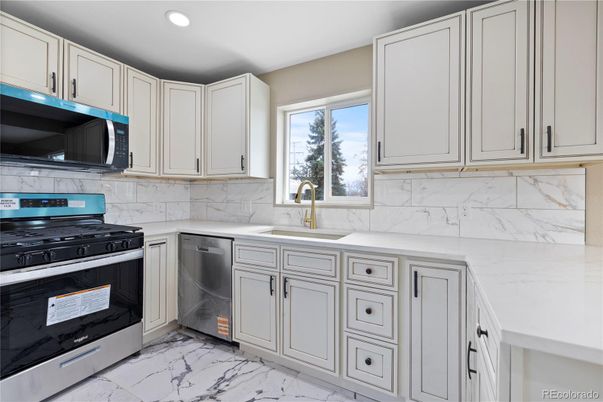 Interior, Kitchen, Marble, Marble Walls, Recessed Lighting, Stainless Steel Appliances