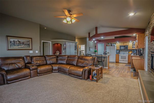 Fireplace, Interior, Kitchen, Living room, Recessed Lighting, Stone Walls, Wood Texture Flooring