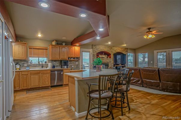 Fireplace, Interior, Kitchen, Recessed Lighting, Stone Walls, Wood Texture Flooring