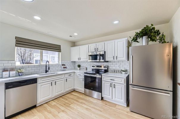Interior, Kitchen, Recessed Lighting, Stainless Steel Appliances, Wood Texture Flooring