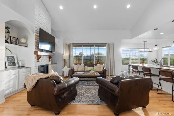 Dining room, Fireplace, Interior, Living room, Pendant Lights, Recessed Lighting, Stone Walls, Wood Texture Flooring