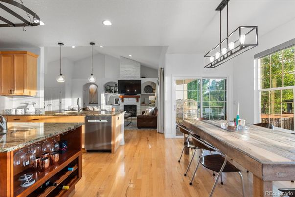Dining room, Fireplace, Interior, Kitchen, Living room, Pendant Lights, Recessed Lighting, Stainless Steel Appliances, Stone Walls, Wood Texture Flooring