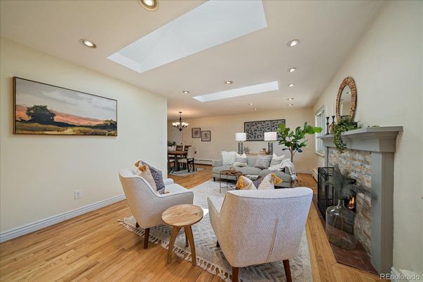 Chandelier, Dining room, Fireplace, Interior, Living room, Recessed Lighting, Wood Texture Flooring
