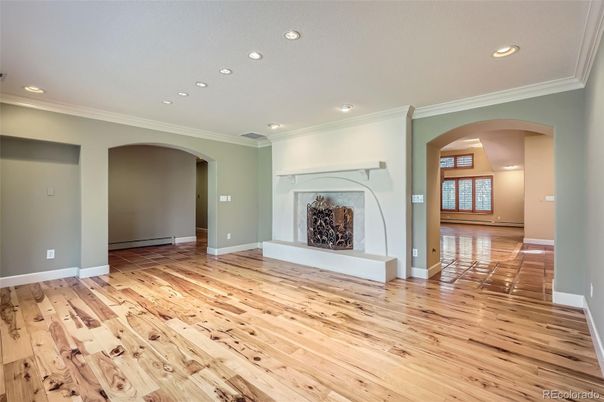 Empty room, Fireplace, Interior, Recessed Lighting, Wood Texture Flooring