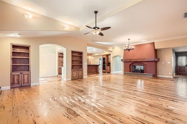 Chandelier, Empty room, Fireplace, Interior, Recessed Lighting, Wood Texture Flooring
