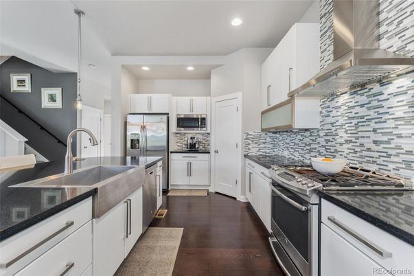 Interior, Kitchen, Pendant Lights, Recessed Lighting, Stainless Steel Appliances, Wood Texture Flooring