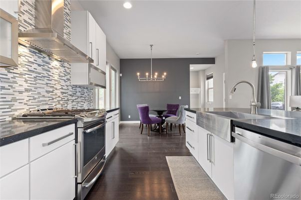 Chandelier, Dining room, Interior, Kitchen, Pendant Lights, Recessed Lighting, Stainless Steel Appliances, Wood Texture Flooring