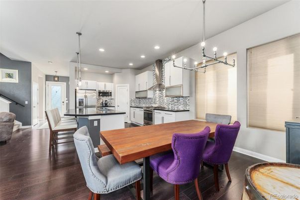 Dining room, Interior, Kitchen, Pendant Lights, Recessed Lighting, Stainless Steel Appliances, Wood Texture Flooring
