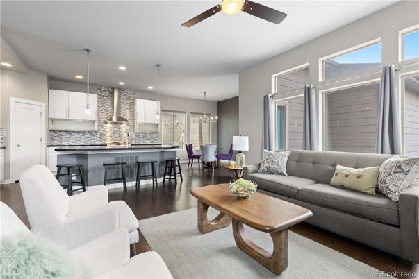Chandelier, Dining room, Interior, Kitchen, Living room, Pendant Lights, Recessed Lighting, Stainless Steel Appliances, Wood Texture Flooring