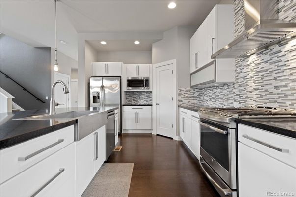Interior, Kitchen, Pendant Lights, Recessed Lighting, Stainless Steel Appliances, Wood Texture Flooring