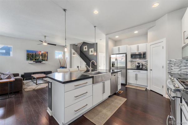 Interior, Kitchen, Pendant Lights, Recessed Lighting, Stainless Steel Appliances, Wood Texture Flooring