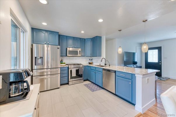 Interior, Kitchen, Pendant Lights, Recessed Lighting, Stainless Steel Appliances, Wood Texture Flooring