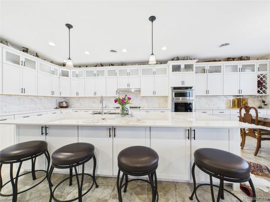 Interior, Kitchen, Marble Walls, Pendant Lights, Recessed Lighting, Stainless Steel Appliances