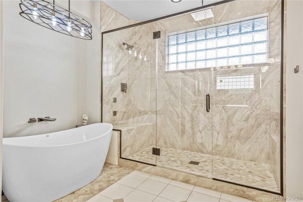 Bathroom, Free Standing Baths, Glass Shower, Interior, Marble Walls, Recessed Lighting
