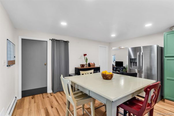 Dining room, Interior, Kitchen, Recessed Lighting, Stainless Steel Appliances, Wood Texture Flooring