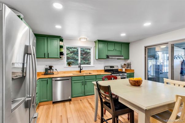 Dining room, Interior, Kitchen, Recessed Lighting, Stainless Steel Appliances, Wood Texture Flooring