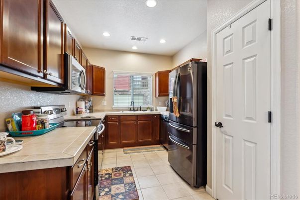Interior, Kitchen, Recessed Lighting, Tile Countertops