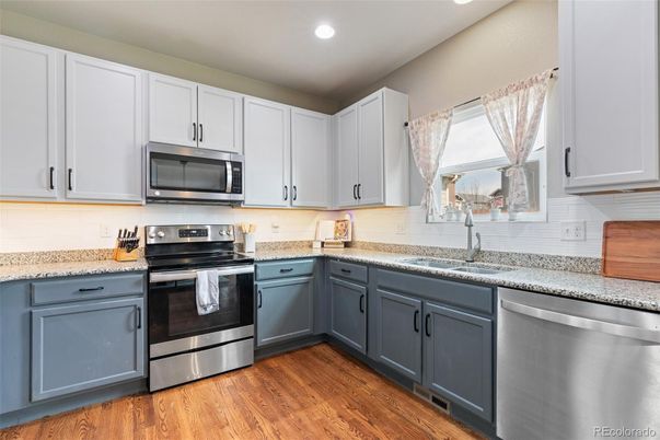 Interior, Kitchen, Recessed Lighting, Stainless Steel Appliances, Wood Texture Flooring
