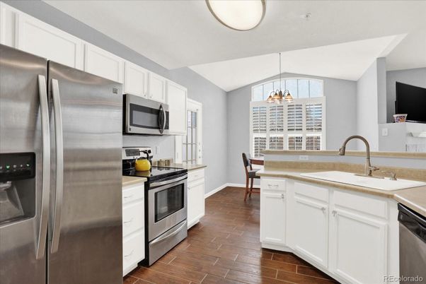 Dining room, Interior, Kitchen, Pendant Lights, Stainless Steel Appliances, Wood Texture Flooring
