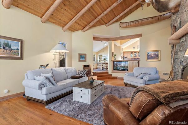 Fireplace, Interior, Living room, Pendant Lights, Wooden Beams, Wooden Ceilings, Wood Texture Flooring