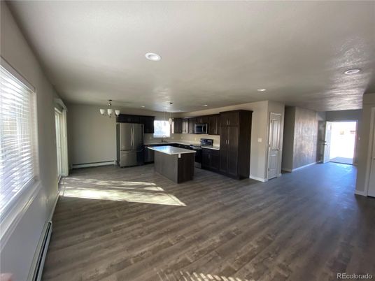 Chandelier, Interior, Kitchen, Recessed Lighting, Stainless Steel Appliances, Wood Texture Flooring