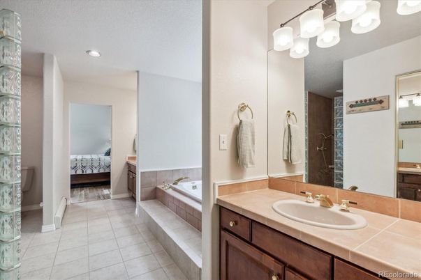 Bathroom, Bedroom, Dual Sink Vanities, Interior, Recessed Lighting, Tile Countertops