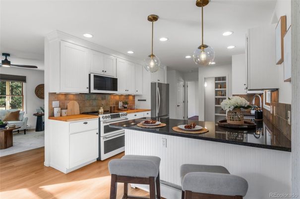 Interior, Kitchen, Pendant Lights, Recessed Lighting, Stainless Steel Appliances, Wood Texture Flooring