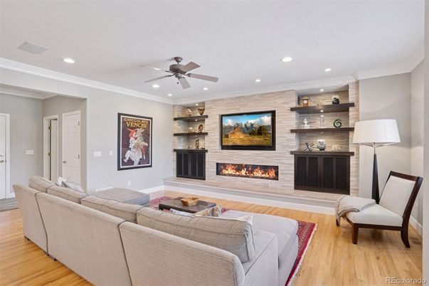 Fireplace, Interior, Living room, Recessed Lighting, Stone Walls, Wood Texture Flooring