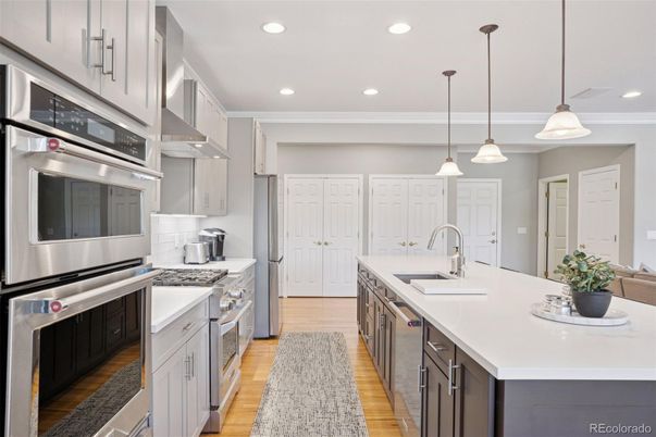Interior, Kitchen, Pendant Lights, Recessed Lighting, Stainless Steel Appliances, Wood Texture Flooring