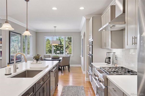 Dining room, Interior, Kitchen, Pendant Lights, Recessed Lighting, Stainless Steel Appliances, Wood Texture Flooring
